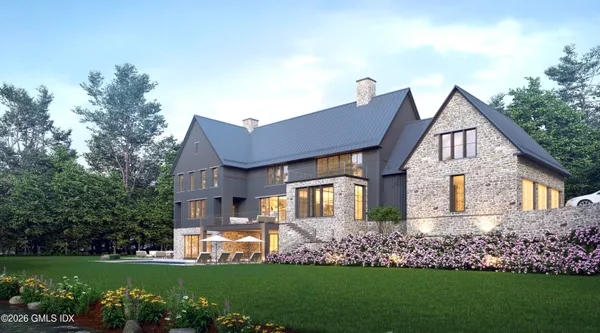 a front view of house with garden
