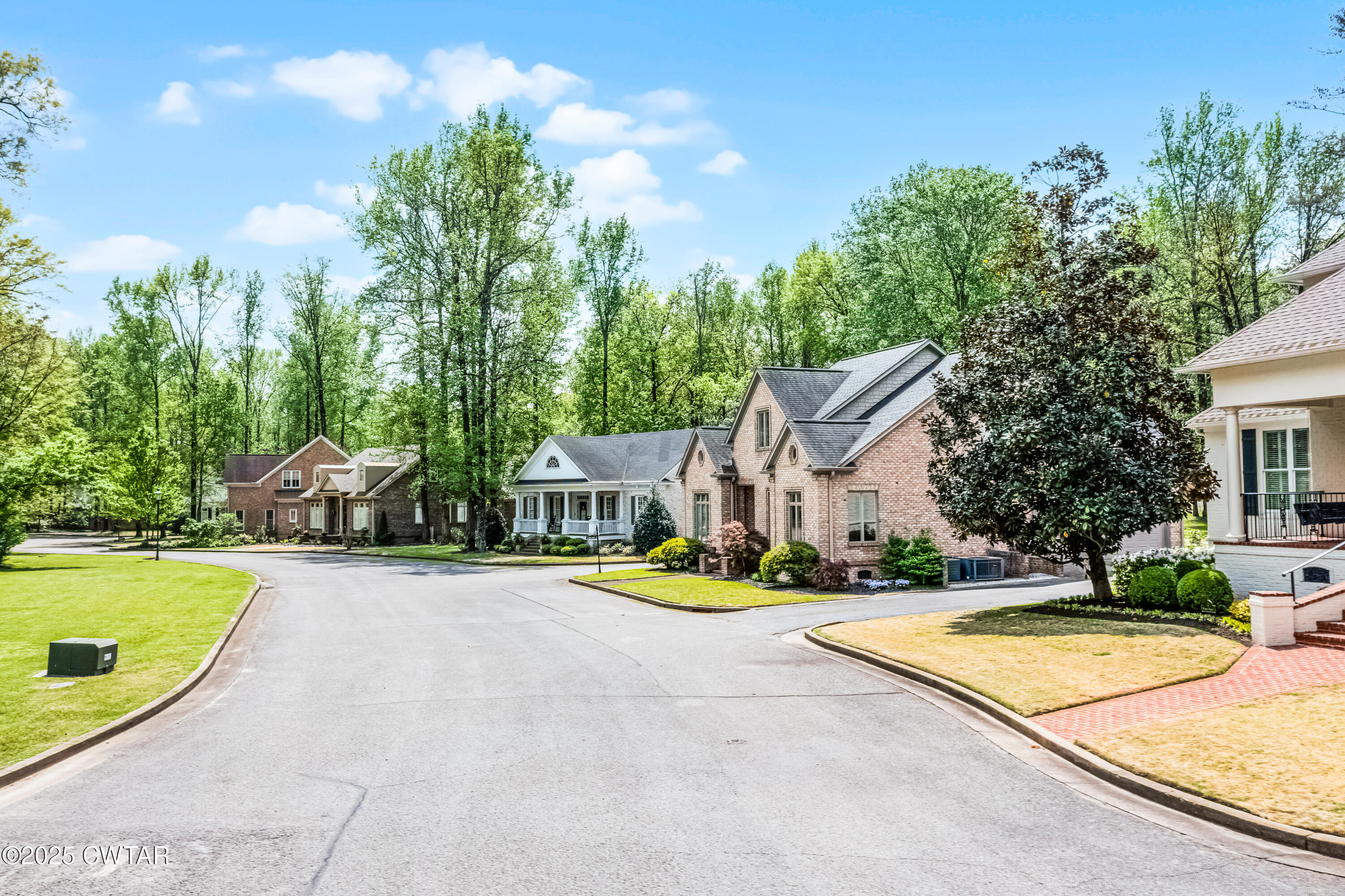 11 Frankland Avenue Jackson, TN 38301 - Photo 8 of 14 a view of an house with backyard and swimming pool