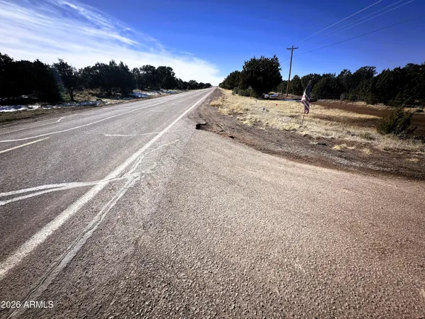 a view of a road with sunset