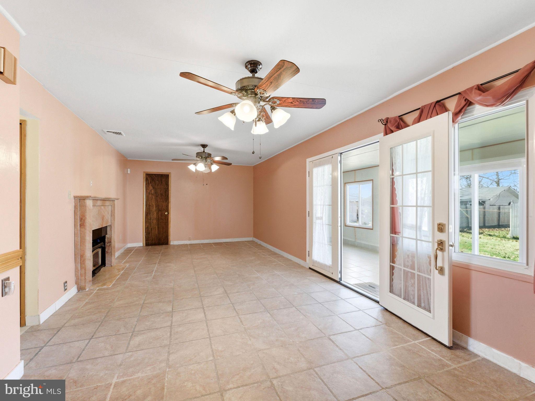 77 Gaping Rock Road Levittown, PA 19057 - Photo 16 of 39 Living Room with fireplace