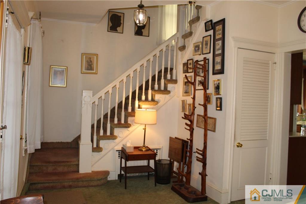 142 Rector Street Perth Amboy, NJ 08861 - Photo 2 of 22 a view of entryway and hall with wooden floor