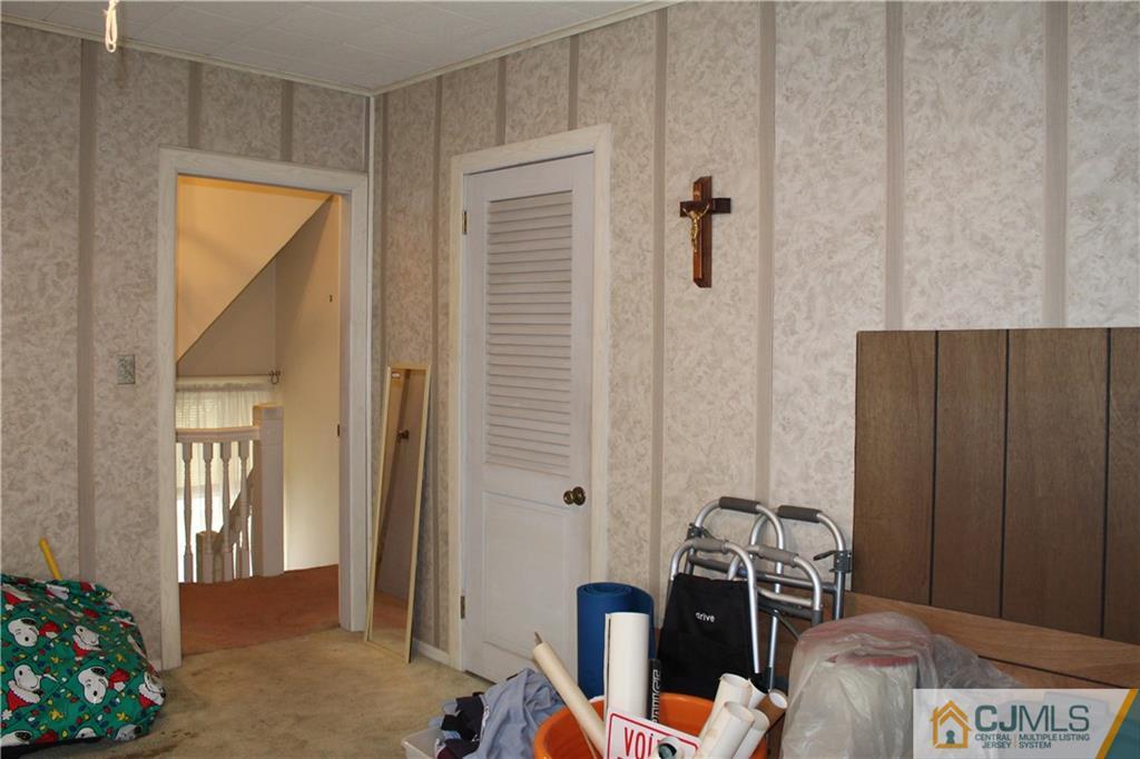 142 Rector Street Perth Amboy, NJ 08861 - Photo 17 of 22 a workspace with furniture and window