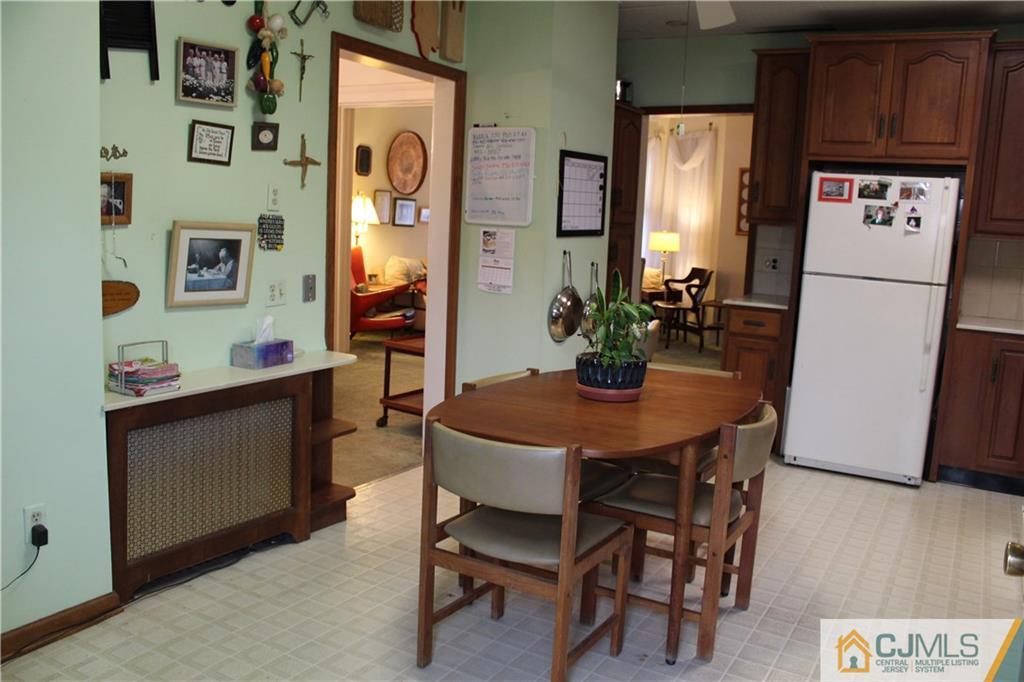 142 Rector Street Perth Amboy, NJ 08861 - Photo 10 of 22 a view of a dining room with furniture