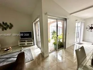 a bedroom with a bed and a chair