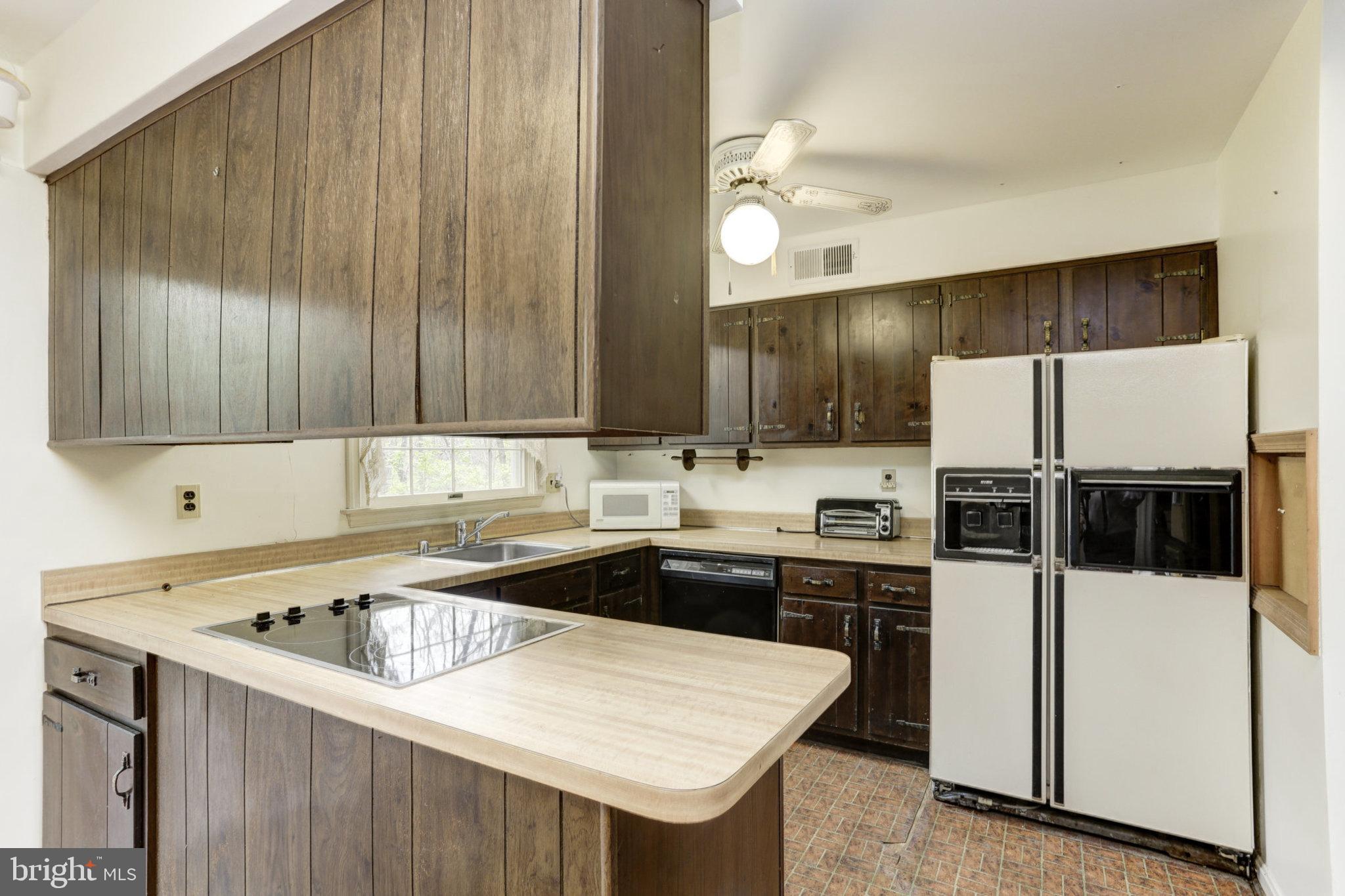 836 Hoods Mill Road Cooksville, MD 21723 - Photo 8 of 29 Rich wood cabinetry w/ ample storage