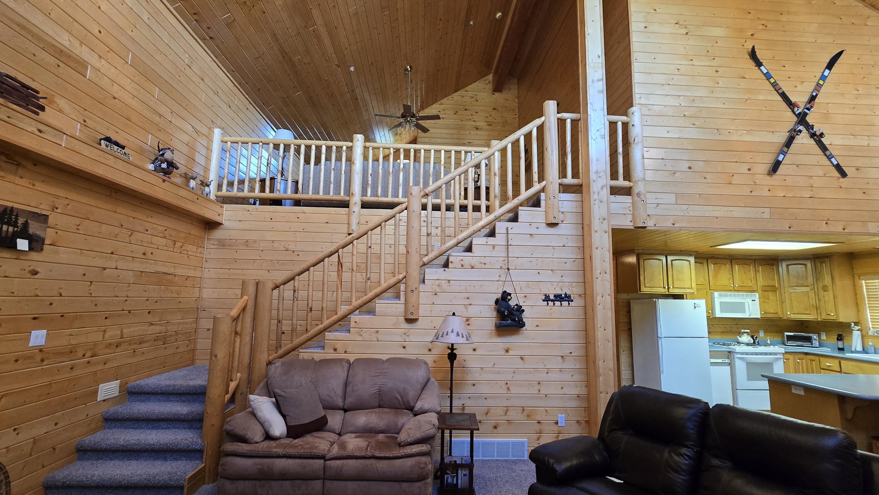 650 South Ridge Point Drive Panguitch, UT 84759 - Photo 17 of 38 Looking up towards loft and secondary bedrooms
