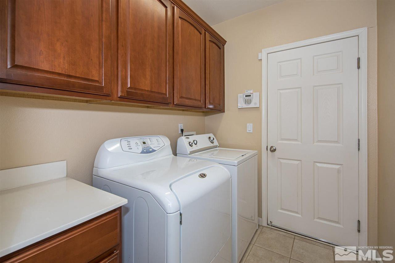 856 North University Park Loop Reno, NV 89512 - Photo 13 of 22 a utility room with dryer and washer