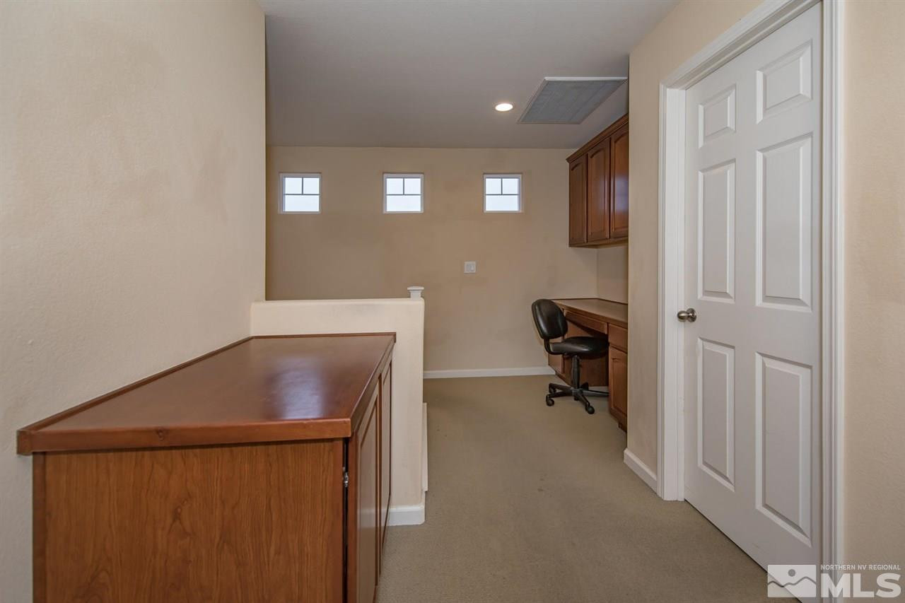 856 North University Park Loop Reno, NV 89512 - Photo 14 of 22 a view of livingroom with furniture and a window