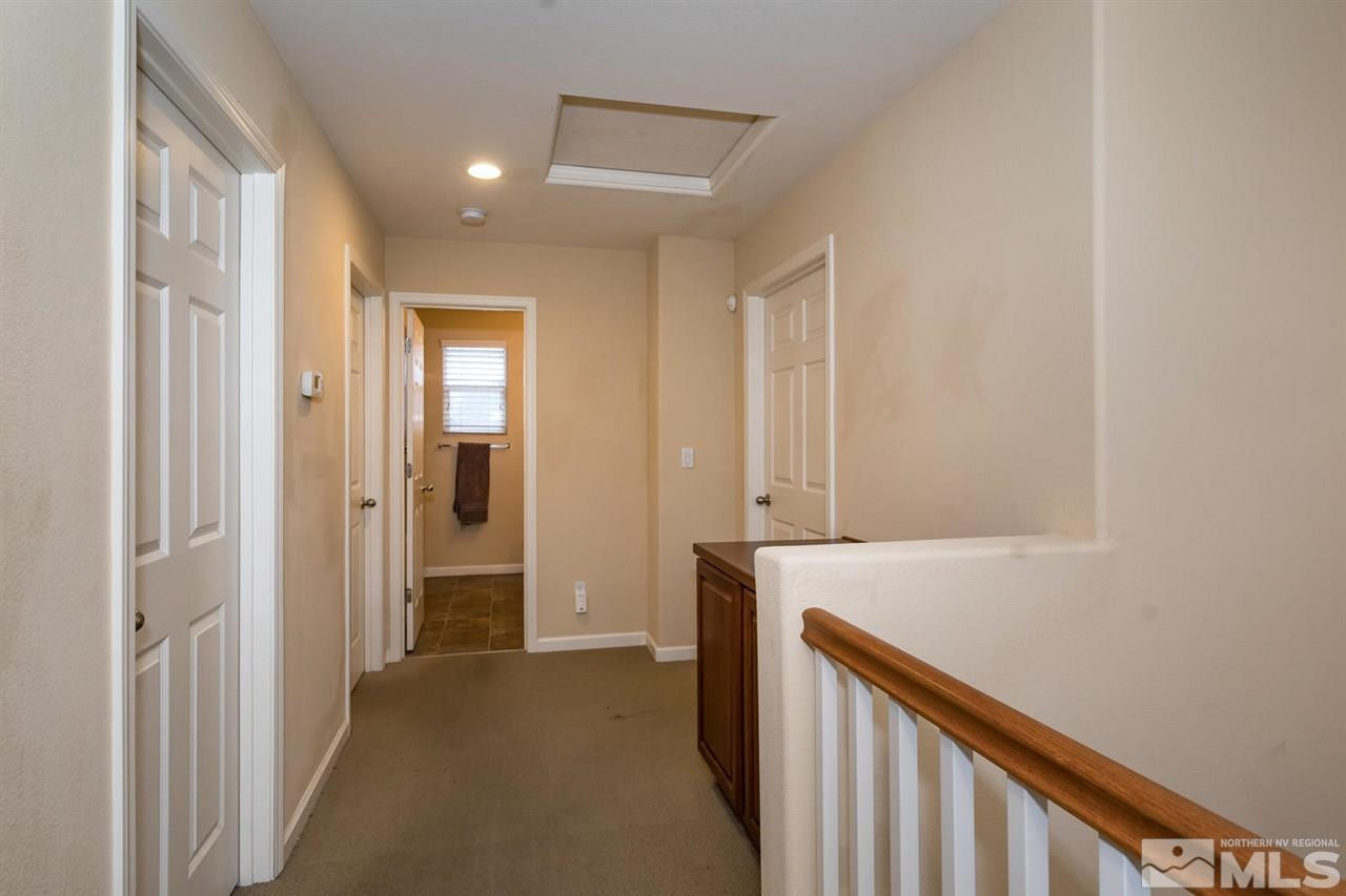 856 North University Park Loop Reno, NV 89512 - Photo 15 of 22 a view of hallway with closet and wooden floor