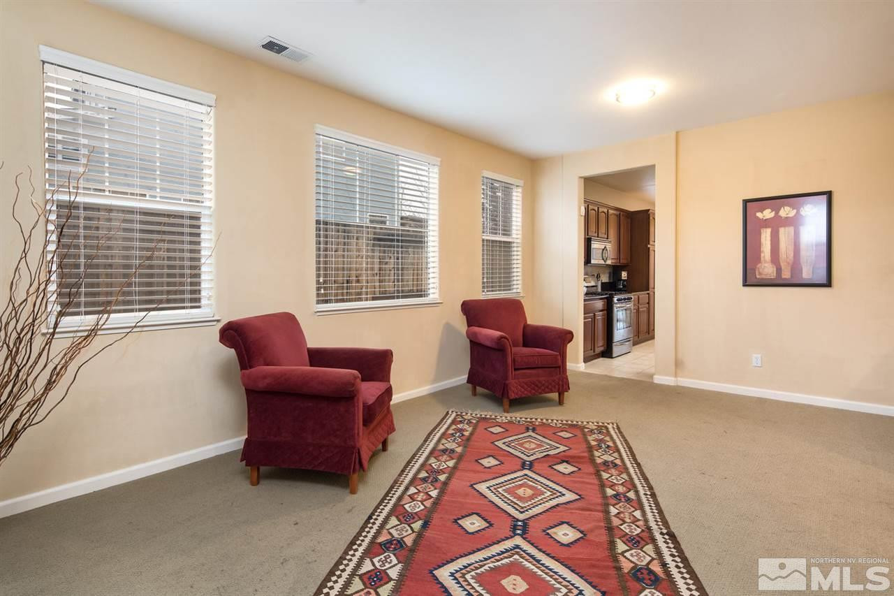 856 North University Park Loop Reno, NV 89512 - Photo 2 of 22 a living room with furniture and a window