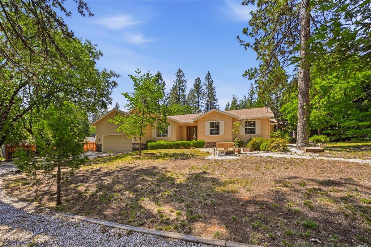 12600 Friar Tuck Road Grass Valley, CA 95949 - Photo 30 of 56 a front view of a house with a yard