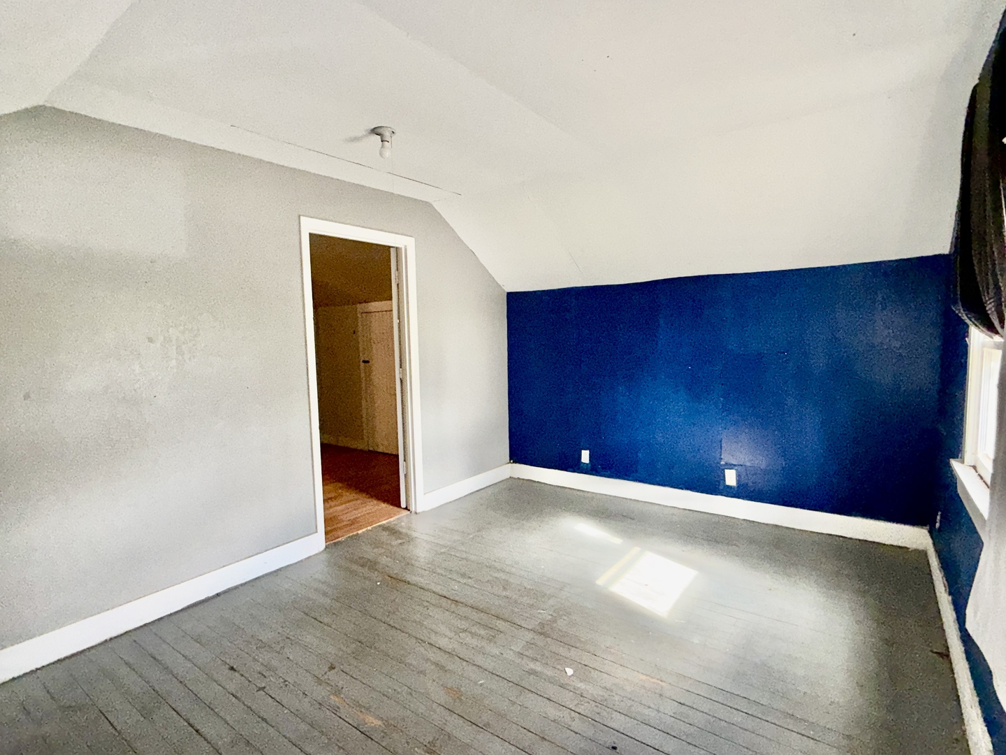 203 West 12th Street Metropolis, IL 62960 - Photo 17 of 27 a view of an empty room and wooden floor