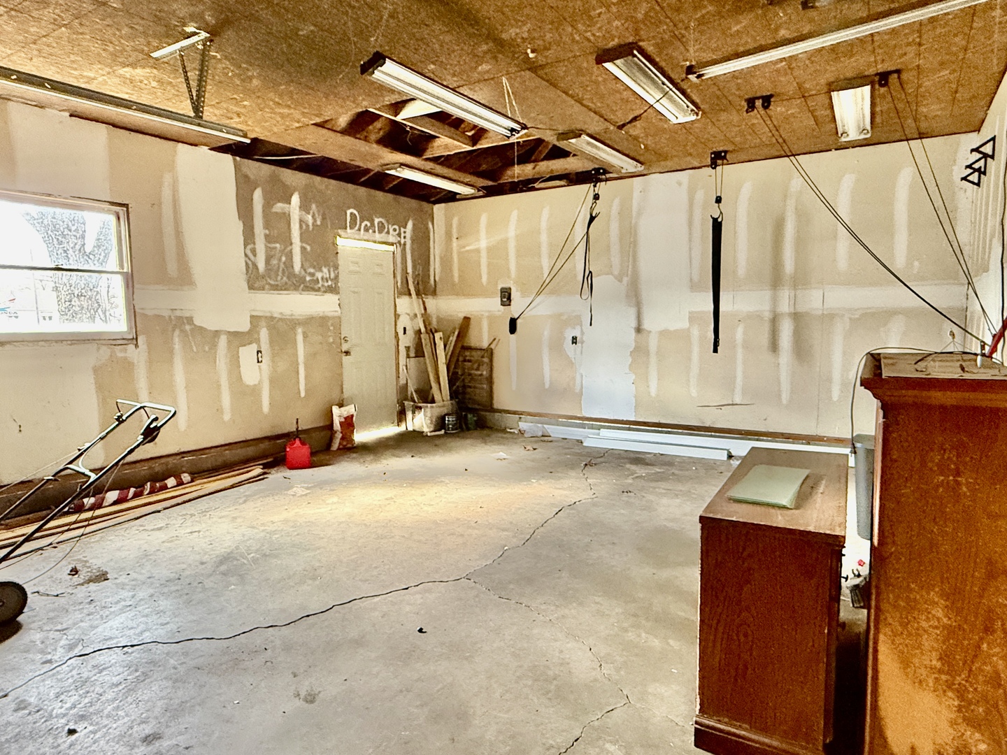 203 West 12th Street Metropolis, IL 62960 - Photo 23 of 27 a view of a garage with wooden floor