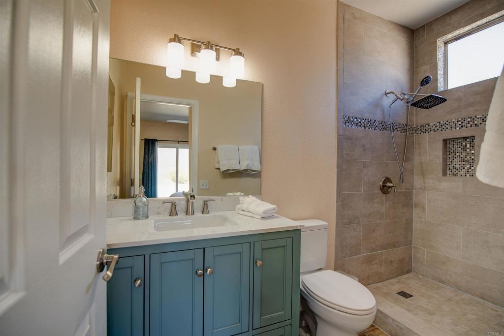 3302 Swinging V Road Borrego Springs, CA 92004 - Photo 8 of 14 a bathroom with a sink a toilet and shower