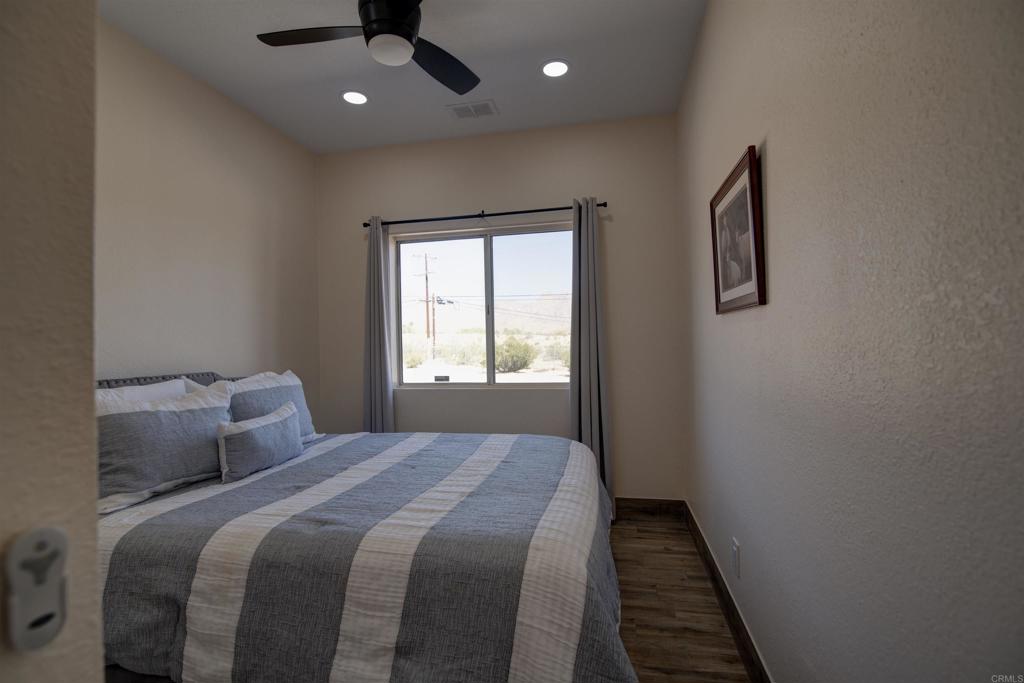 3302 Swinging V Road Borrego Springs, CA 92004 - Photo 9 of 14 a bedroom with a bed and a window