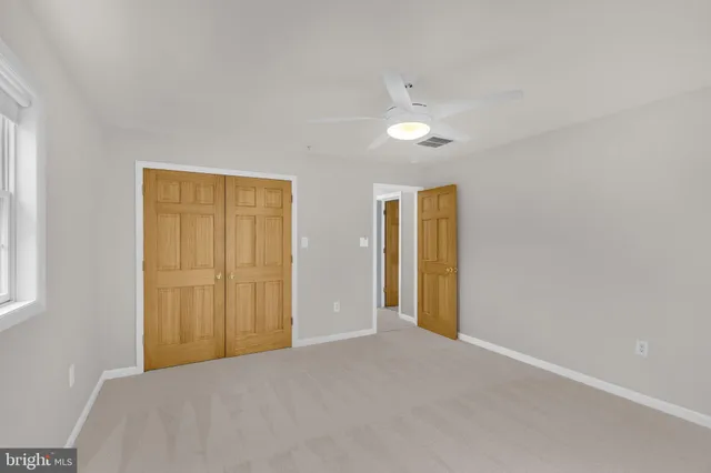 a view of a room with racks on the wall