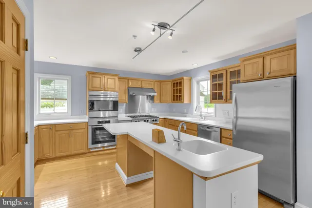 a kitchen that has a cabinets and a stove