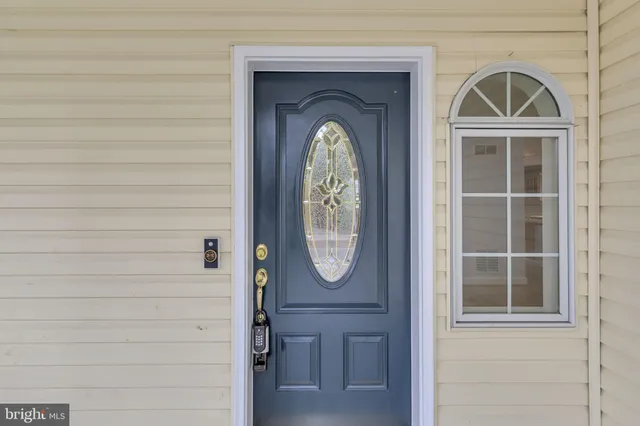 an aerial view of a house with outdoor space swimming pool and outdoor seating