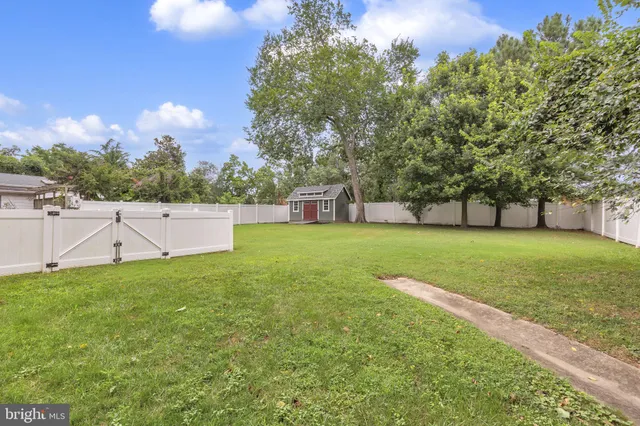 an aerial view of a house with mountain view