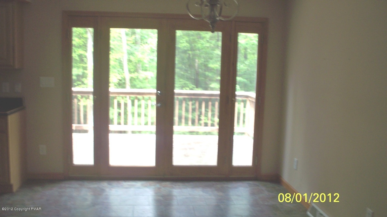 dining area with french doors to deck