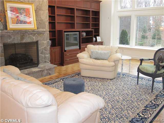 2300 Worchester Road Midlothian, VA 23113 - Photo 5 of 12 a living room with furniture and a fireplace