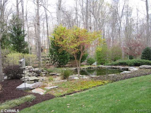 2300 Worchester Road Midlothian, VA 23113 - Photo 9 of 12 a backyard of a house with lots of green space