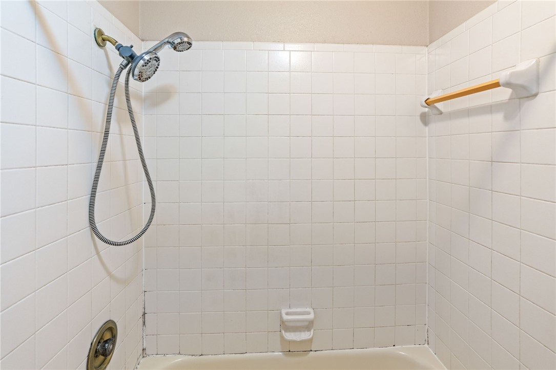 7209 Candy Ridge Road Corpus Christi, TX 78413 - Photo 14 of 24 a bathroom with a shower
