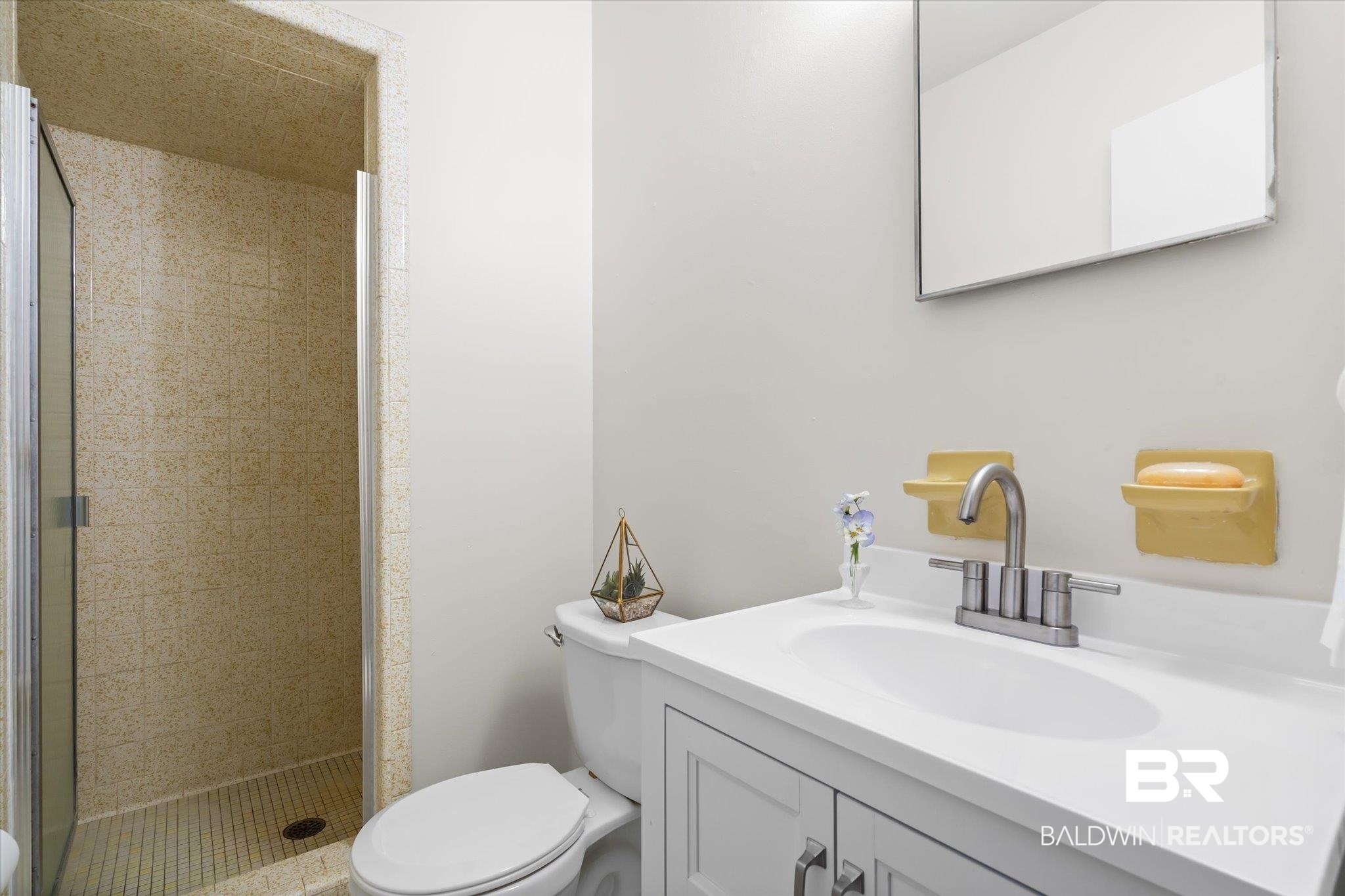 6848 Sandra Drive Theodore, AL 36582 - Photo 4 of 21 Bathroom with vanity, toilet, and a shower with door