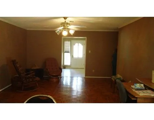 a black and white photo of a living room