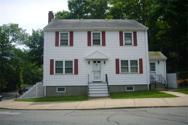 1 Pine Point Road Lynn, MA 01904 - Photo 1 of 15 a front view of a house with a yard
