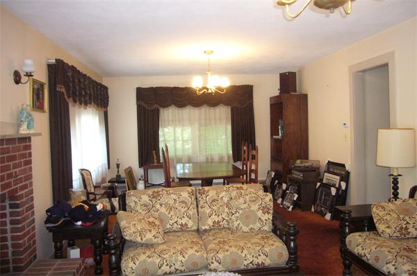 1 Pine Point Road Lynn, MA 01904 - Photo 4 of 15 a living room with furniture and a large window