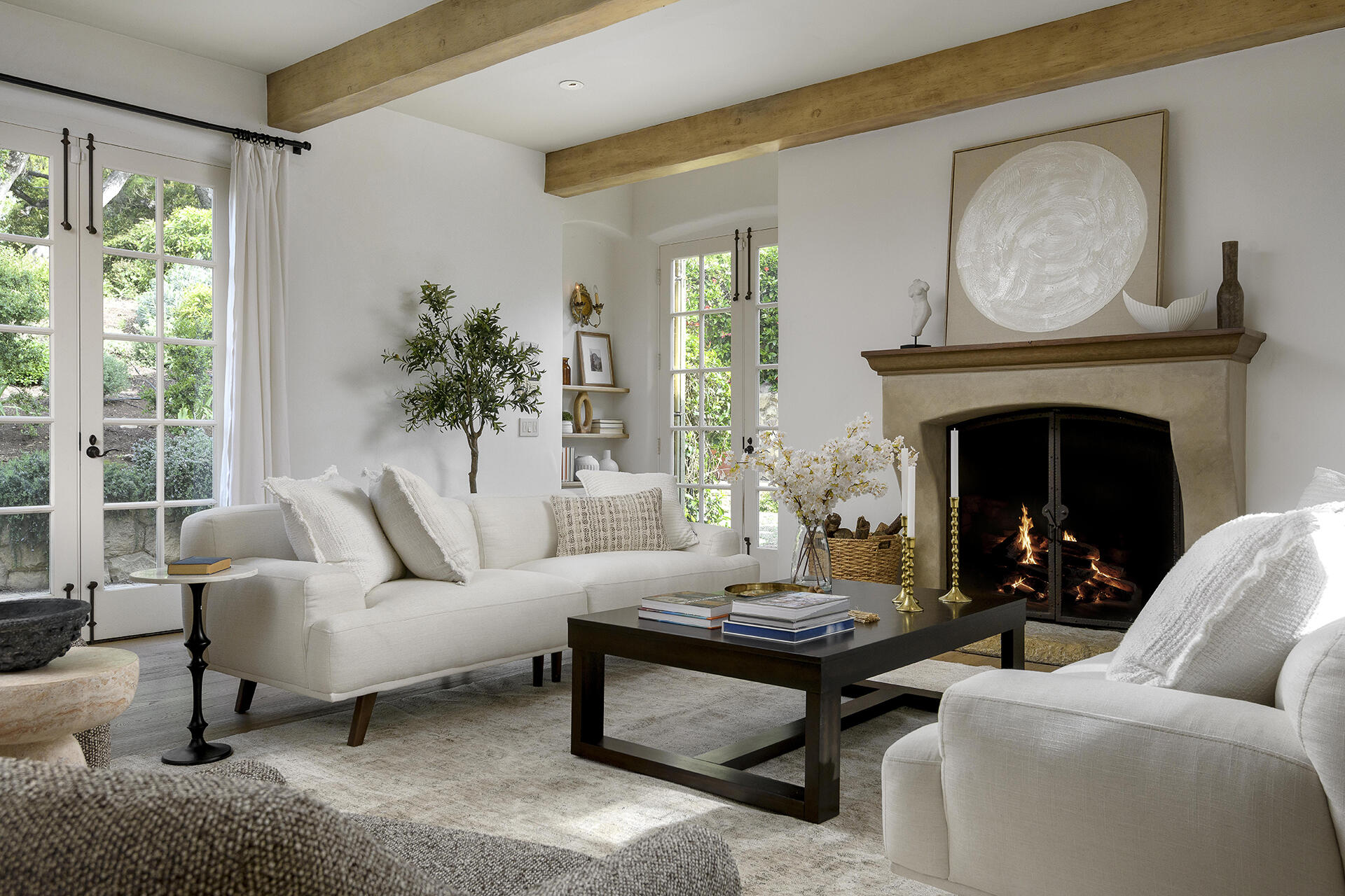 640 El Bosque Road Montecito, CA 93108 - Photo 2 of 36 a living room with furniture and a fireplace