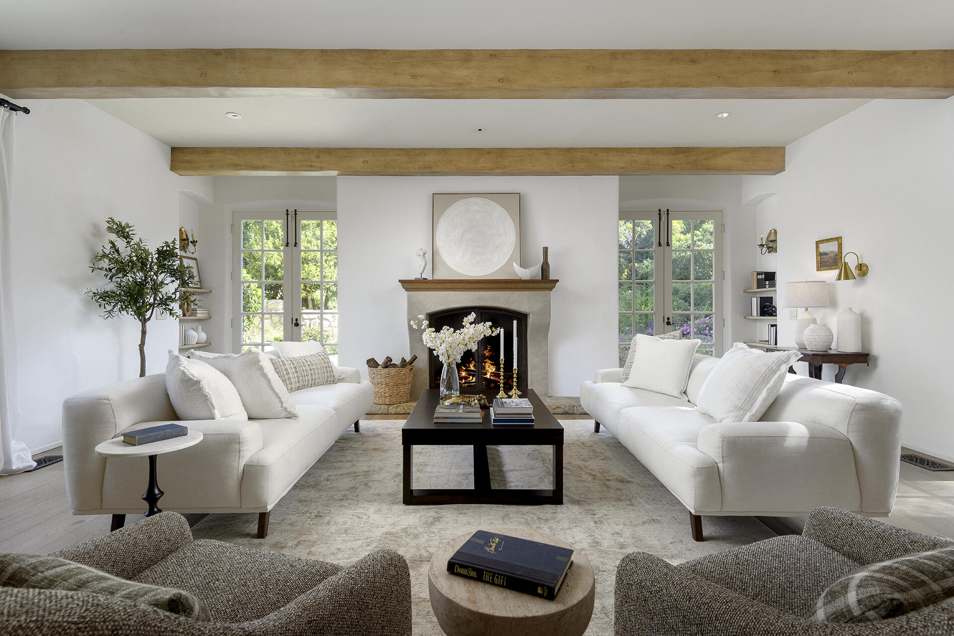 640 El Bosque Road Montecito, CA 93108 - Photo 3 of 36 a living room with furniture and a fireplace