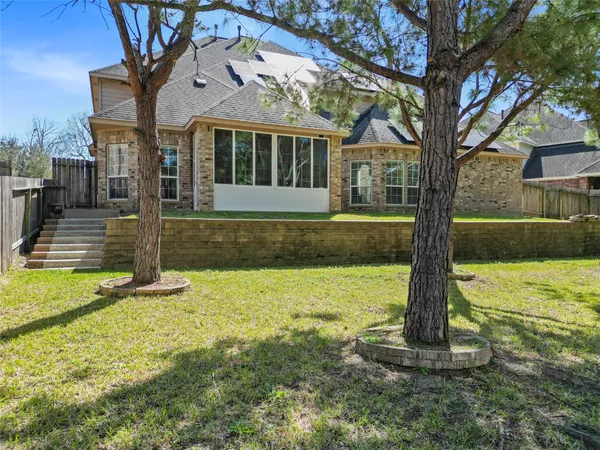 a backyard of a house with lots of green space