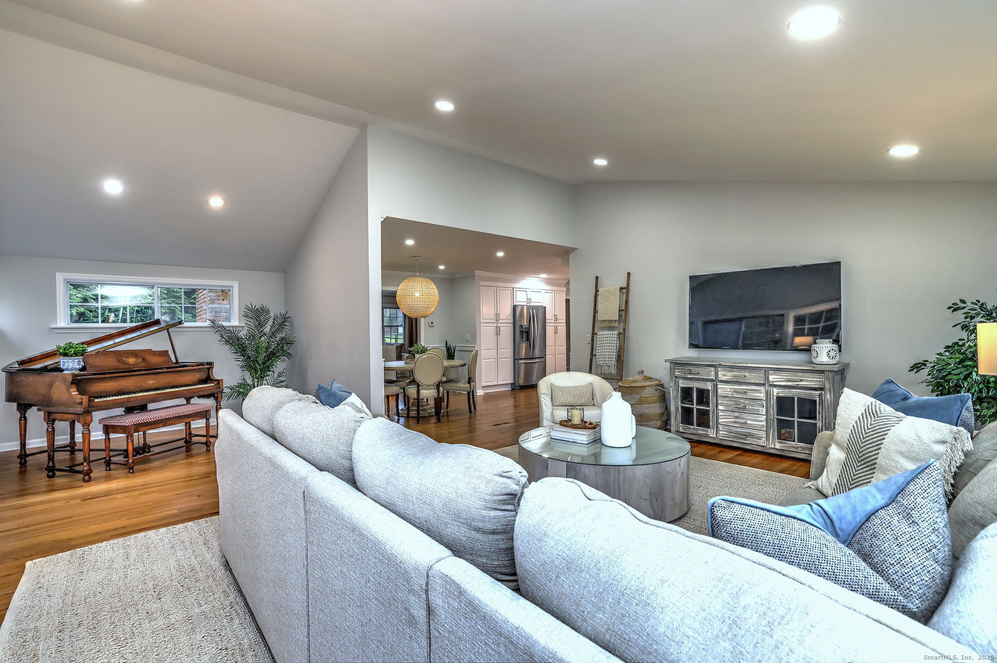 119 Wedgemere Road Stamford, CT 06905 - Photo 13 of 40 a living room with furniture and a flat screen tv