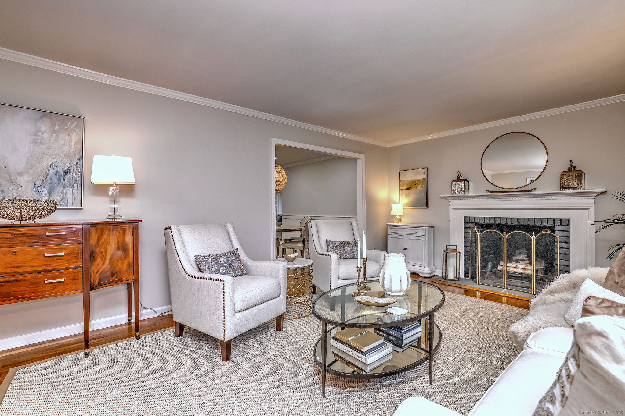 119 Wedgemere Road Stamford, CT 06905 - Photo 16 of 40 a living room with furniture a fireplace and window