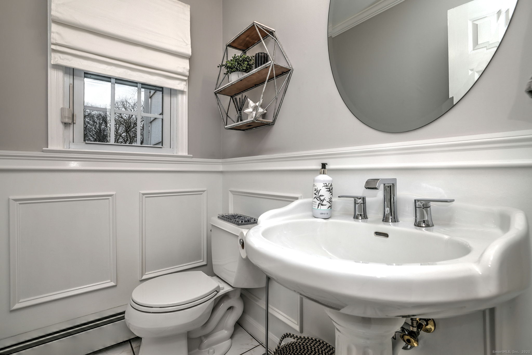 119 Wedgemere Road Stamford, CT 06905 - Photo 20 of 40 a bathroom with a sink and a toilet