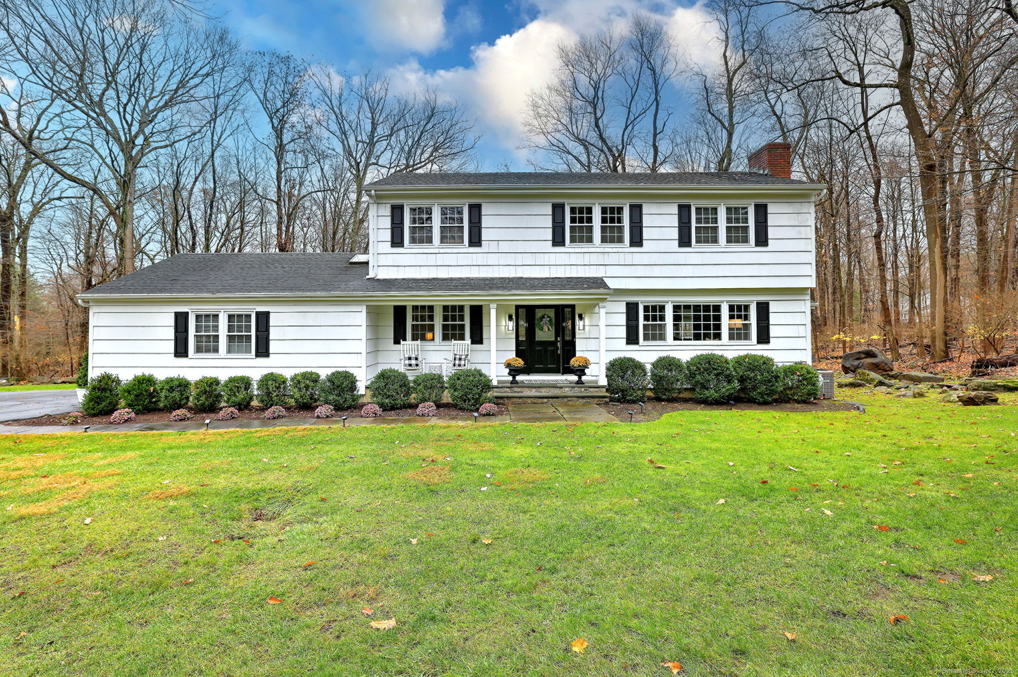 119 Wedgemere Road Stamford, CT 06905 - Photo 2 of 40 a front view of a house with a yard