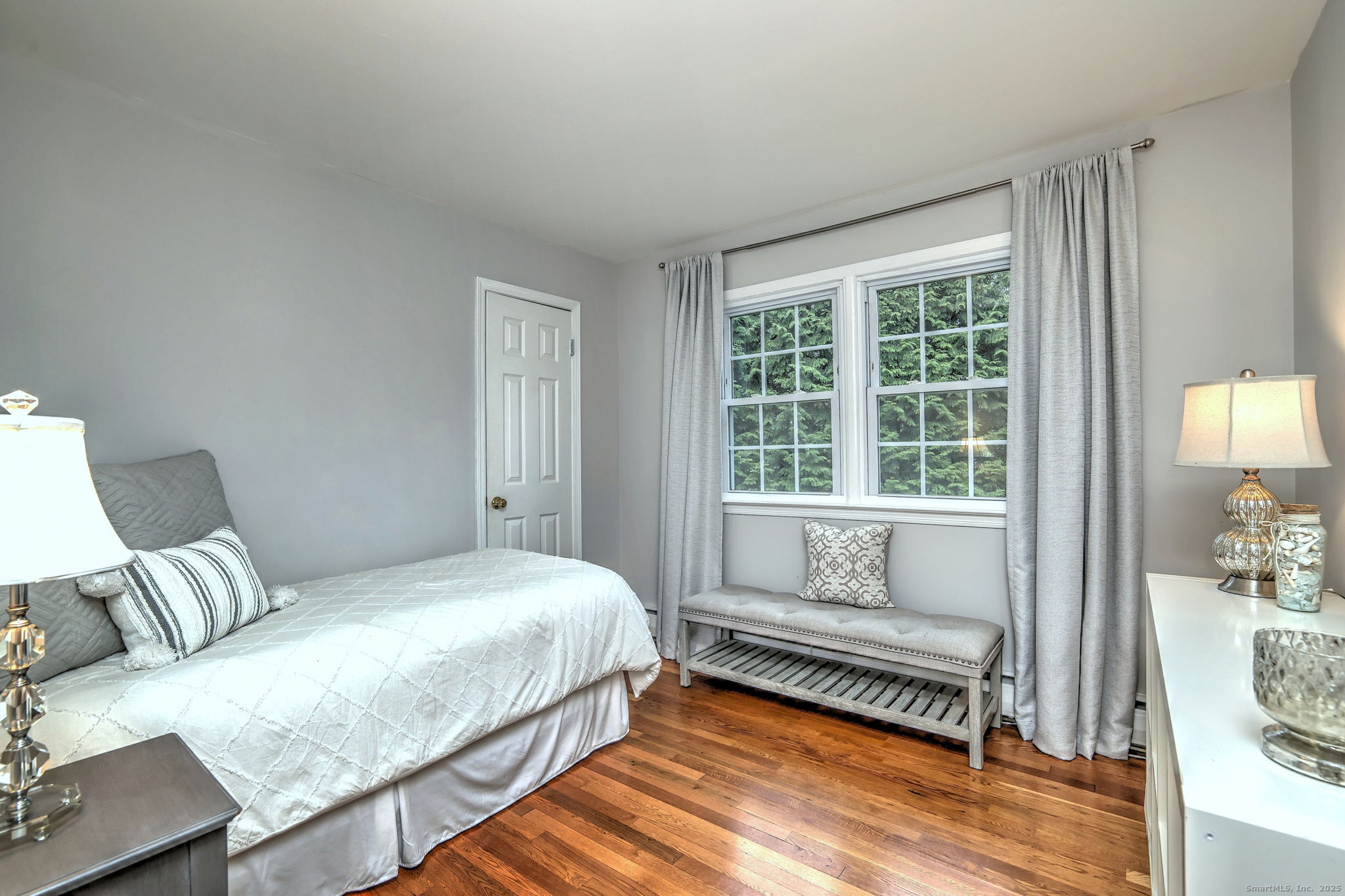 119 Wedgemere Road Stamford, CT 06905 - Photo 28 of 40 a bedroom with a bed and a window