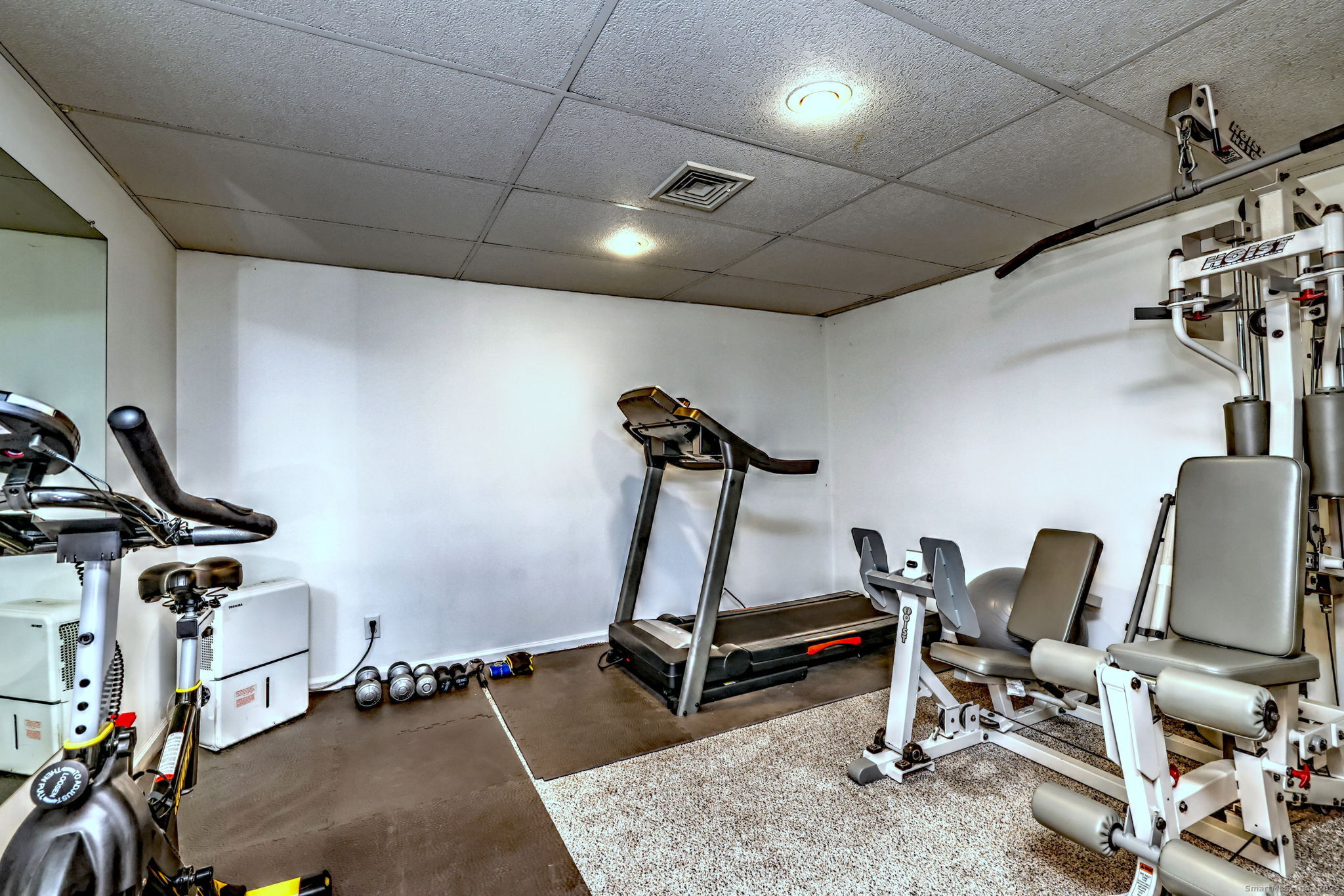 119 Wedgemere Road Stamford, CT 06905 - Photo 32 of 40 a view of a room with gym equipment