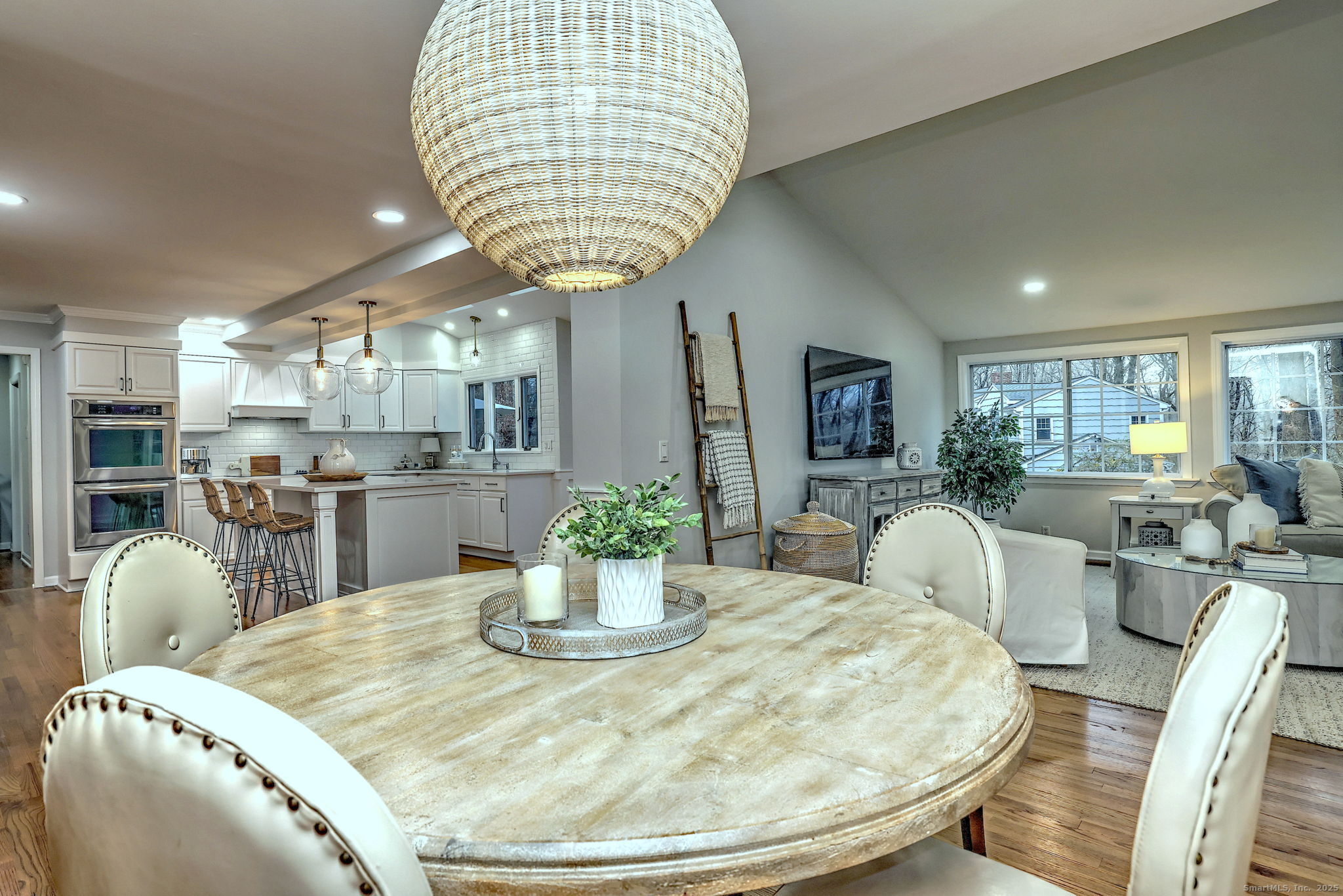 119 Wedgemere Road Stamford, CT 06905 - Photo 5 of 40 a kitchen with a dining table and chairs
