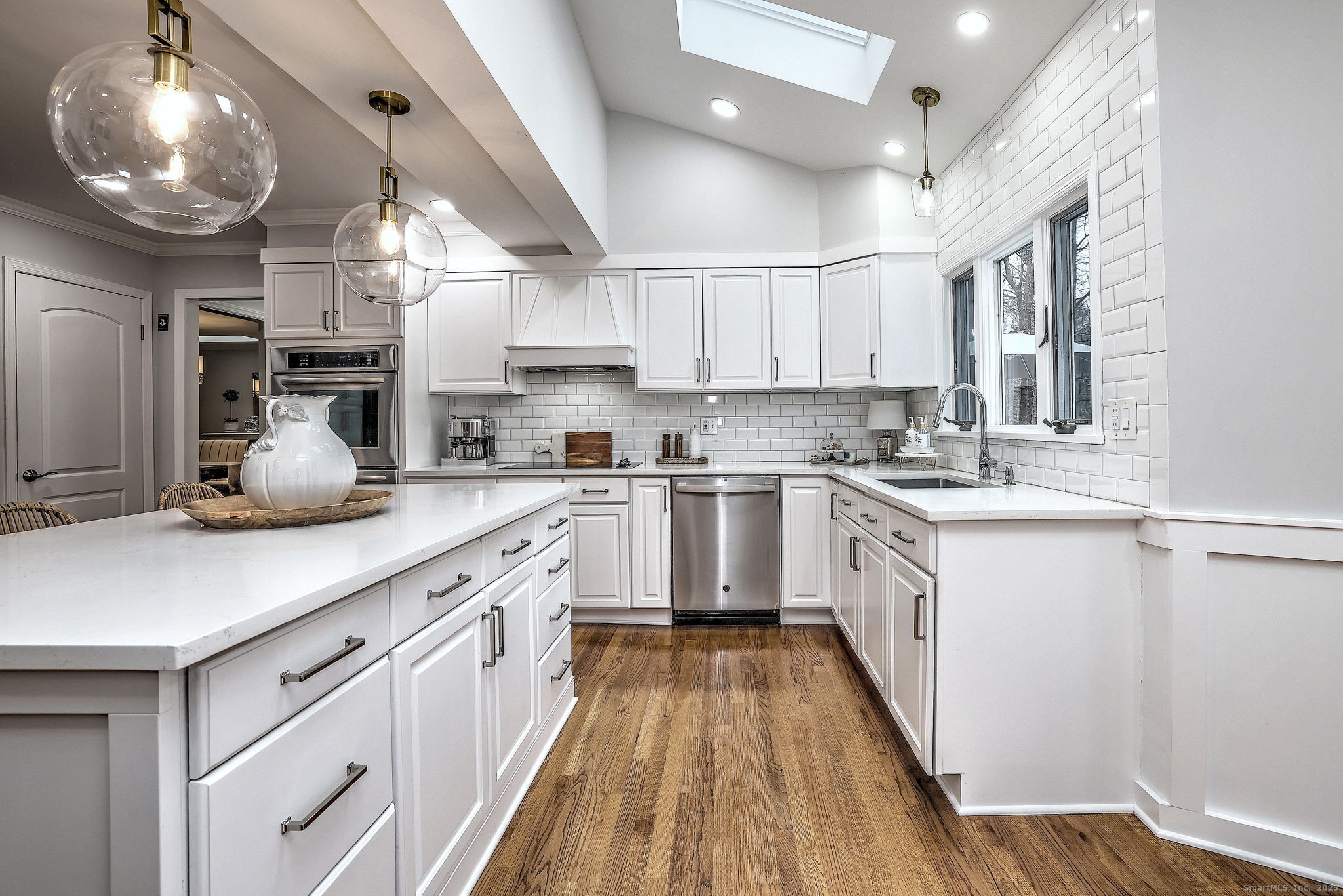 119 Wedgemere Road Stamford, CT 06905 - Photo 8 of 40 a kitchen with cabinets a sink and appliances