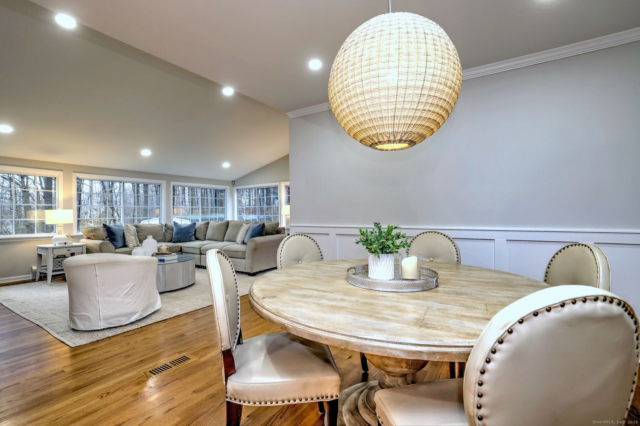 119 Wedgemere Road Stamford, CT 06905 - Photo 9 of 40 a living room with furniture a dining table and a wooden floor