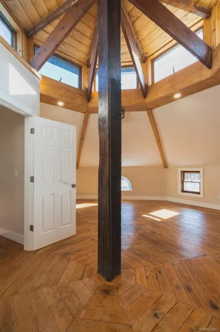 a spacious bathroom with a bathtub and shower