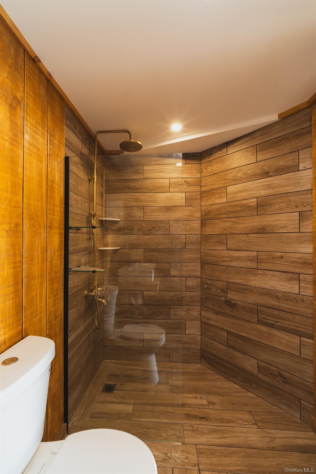 15 Deans Road Napanoch, NY 12458 - Photo 9 of 21 a bathroom with a toilet and shower