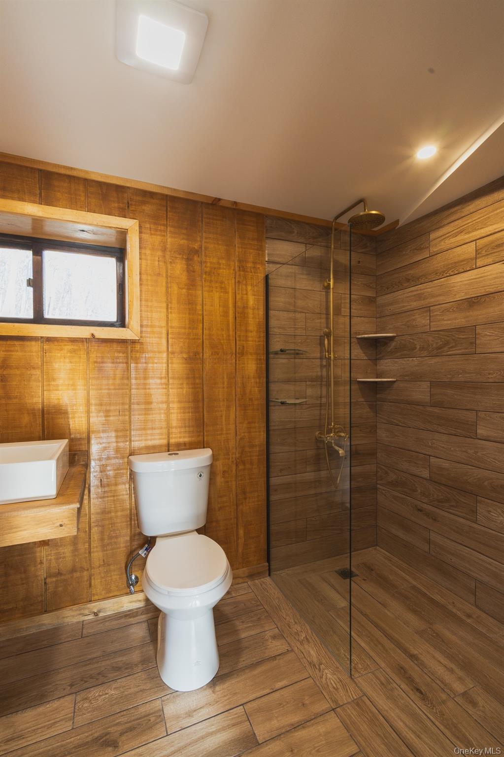 15 Deans Road Napanoch, NY 12458 - Photo 10 of 21 a bathroom with a toilet and a shower