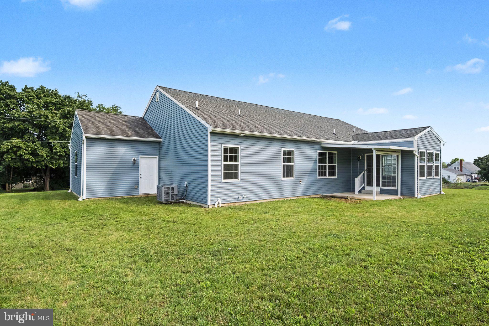 420 Cornman Road Carlisle, PA 17013 - Photo 25 of 28 Backyard with covered patio