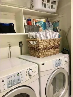 a close view of laundry room with washer and dryer