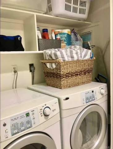 a close view of laundry room with washer and dryer