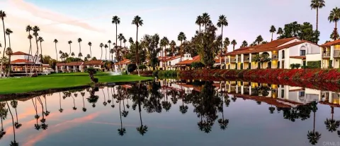 a view of a lake and a garden